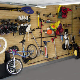 Sports equipment organized on slatwall panels