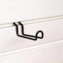 Wide 3 Inch Steel Hook shown on slatwall panels