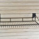 Turnlock Large Wire Shelf on slatwall panels