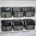 Black HandiWall Utility BIns on slatwall