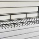 Slatwall shelf on slatwall panels