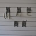 organized living hooks on slatwall panels